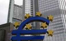 ECB begins cautious taper while holding rates
