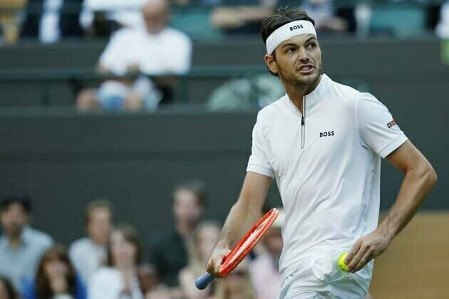 Taylor Fritz staves off upset attempt to advance at Wimbledon
