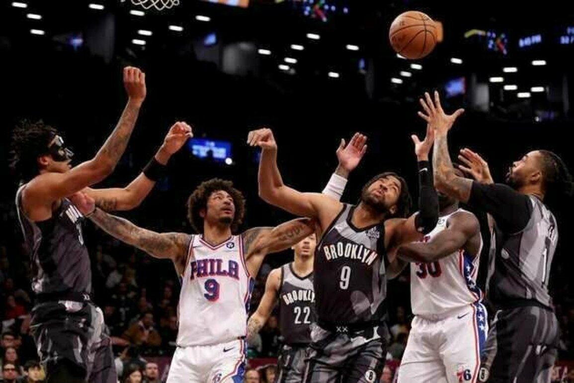 Surging Nets hold on against struggling Sixers