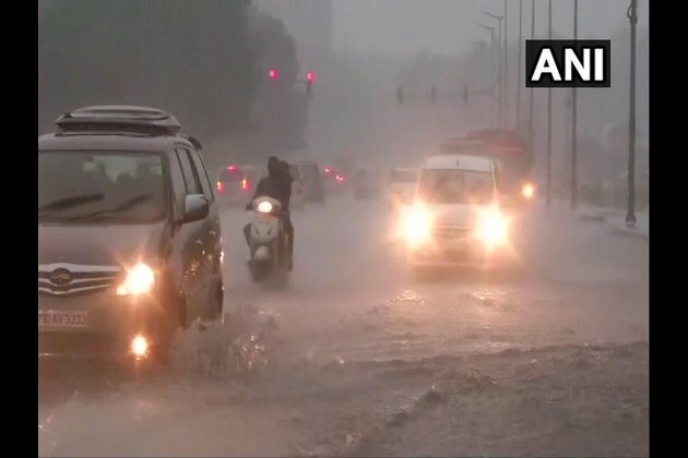Rain lashes parts of Delhi, temperature dips to 27 degrees