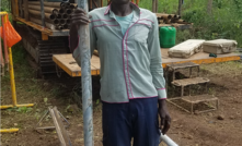 Staff with staff: A Kodal drill engineer showing of his core strength