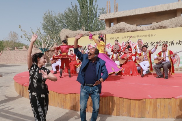 Musical instrument-making orchestrates economic growth, cultural exchange in remote Xinjiang village