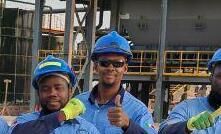 Kodal Minerals processing team with first spodumene