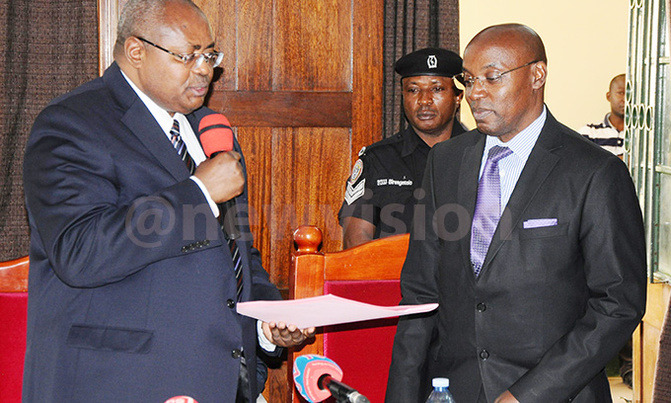 Bamwine hands over office to new Principal Judge Bamwine hands over office to new Principal Judge