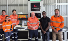 Hillgrove geological team with ECORE Elemission technician in front of the ECORE core scanning system at Larvotto’s exploration facility