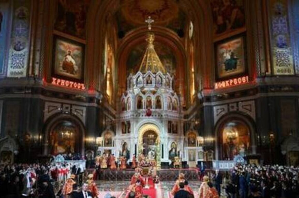 Putin attends Easter service as Russians mark Orthodox Christianity's holiest day
