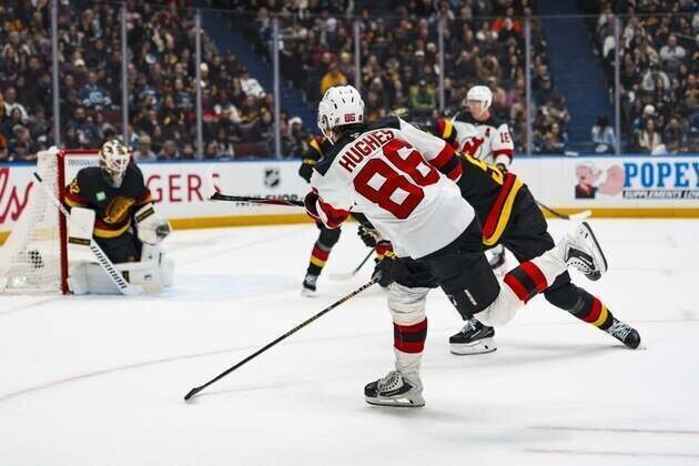 Cody Glass' 3-point night steers Devils to win over Canucks
