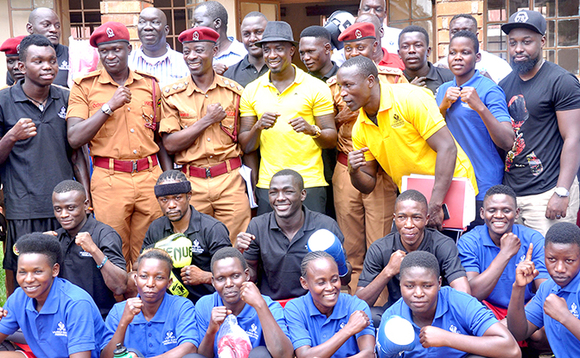 Ttiimu ya The Bombers mu kkomera e Luzira gy’abadde yakuba enkambi. Wakati mu nkonfiira enzirugavu ye Moses Muhangi. Amuddiridde ku kkono y’amyuka akulira emizannyo e Luzira ASP Robert Lwanve ne ASP Papus Muhurizi, ow’ensambaggere ne taekwondo. Ttiimu ya The Bombers mu kkomera e Luzira gy’abadde yakuba enkambi. Wakati mu nkonfiira enzirugavu ye Moses Muhangi. Amuddiridde ku kkono y’amyuka akulira emizannyo e Luzira ASP Robert Lwanve ne ASP Papus Muhurizi, ow’ensambaggere ne taekwondo.