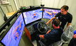 Hitachi applications engineer mining Lampson Zhang shows off the simulator.