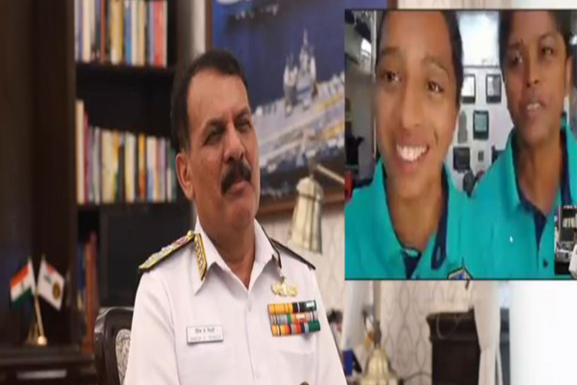 Navy Chief Admiral Dinesh K Tripathi interacts with crew of Navika Sagar Parikrama II onboard INSV Tarini