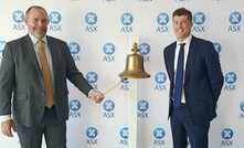  Benz CEO Xavier Braud and director Matthew O'Hara ring the bell