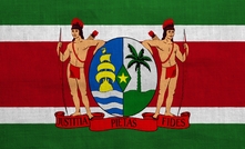 Flag and coat of arms of Republic of Suriname.