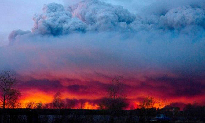 'Catastrophic wildfires' force thousands to flee in Canada 'Catastrophic wildfires' force thousands to flee in Canada