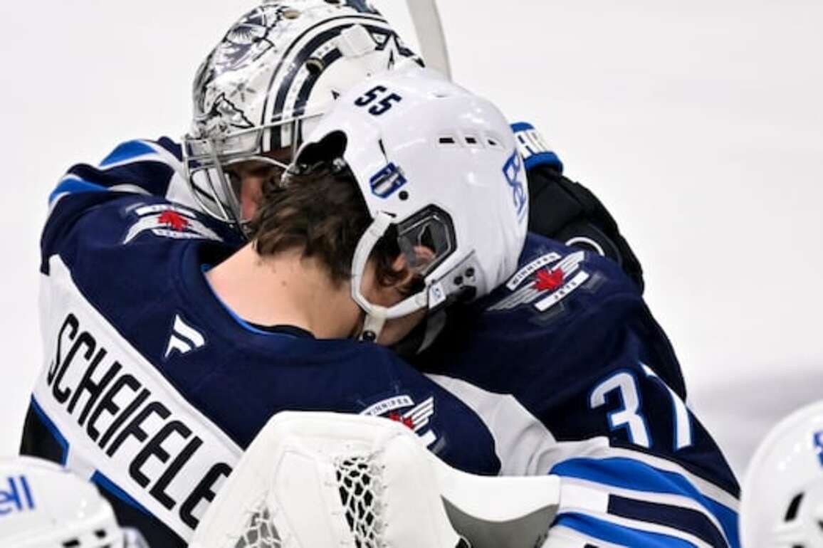 Jets closer, stronger after emotionally challenging season, Hellebuyck says