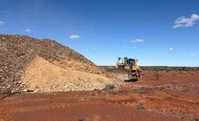 Restoration of access ramp to crest of the stockpiles.