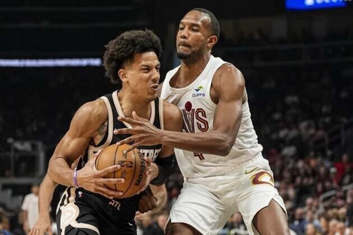 Hawks clinch playoff spot while walloping Cavs