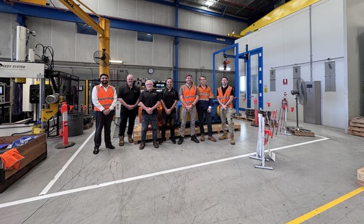 Steve Lewry and Adam Lees (Ontrak Engineering) pictured with Justin Towel and Harry Singh (Bonfiglioli), as well as members of HMA Group during the FAT at Bonfiglioli’s factory in Sydney