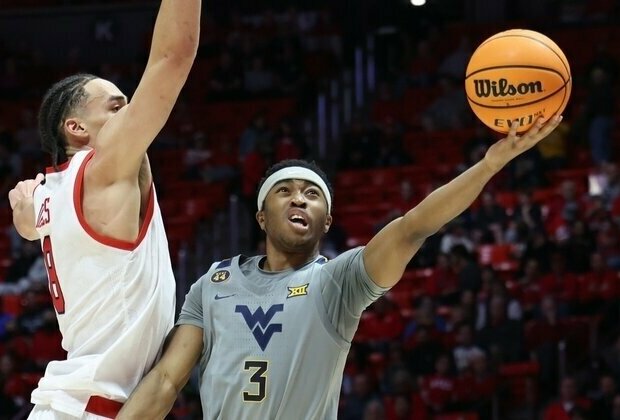 West Virginia slips by Josh Eilert's Utah Utes