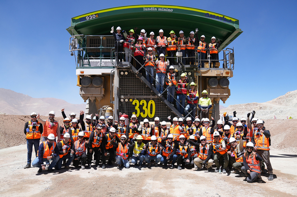 The retrofitted Komatsu trucks and team at Caserones