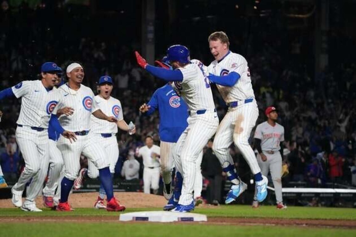 Streaking Cubs, slumping Reds to collide in Chicago