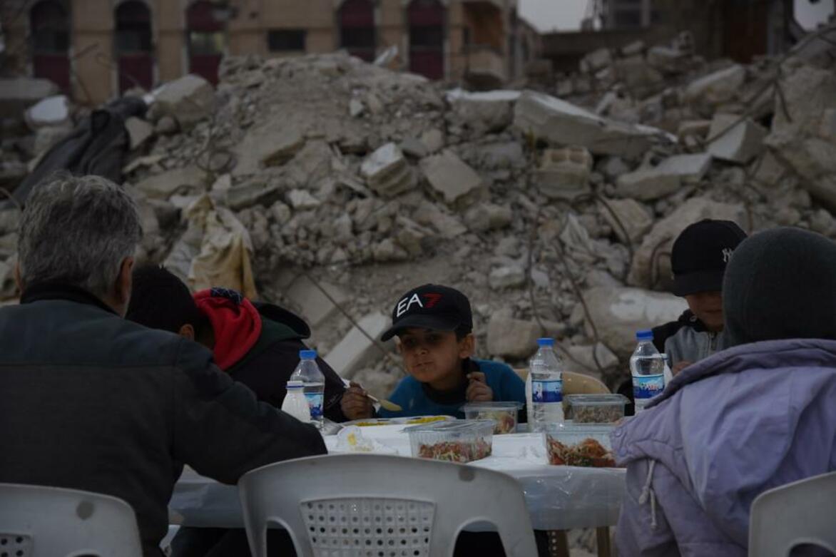 War-weary Syrians gather for iftar amid ruins in Damascus