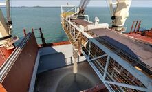 The first Core spodumene concentrate being loaded onto the St Andrew for shipment to China.