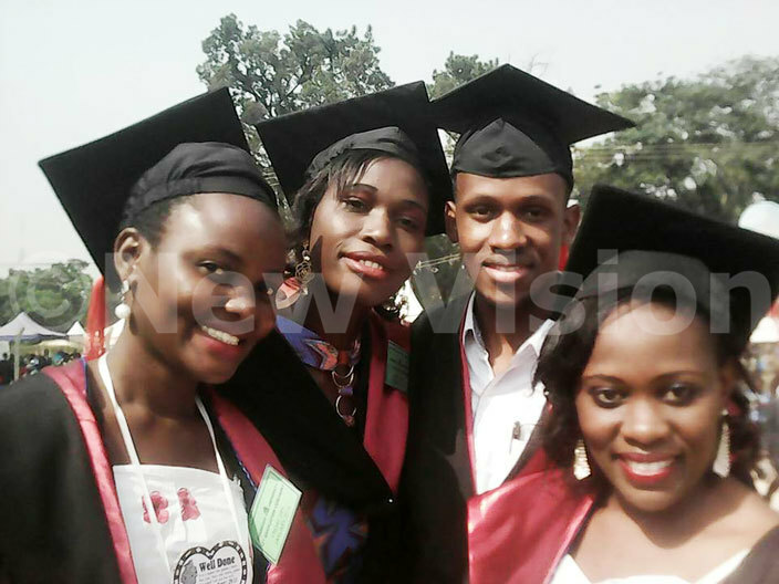 oreen yaburu 2nd left poses for a photo with colleagues during their graduation at yambogo university