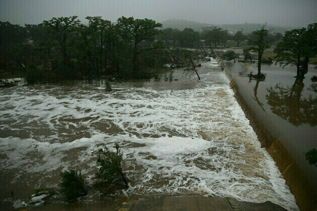 Death toll in Texas floods rises to at least 27 as search continues for many missing