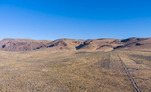  Aerial view of a dirt road leading up through The Thacker Pass Lithium mining area in the arid Nevada desert - Credit:gchapel