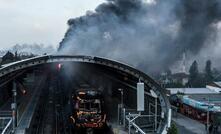 A Metro train burns in Santiago, Chile