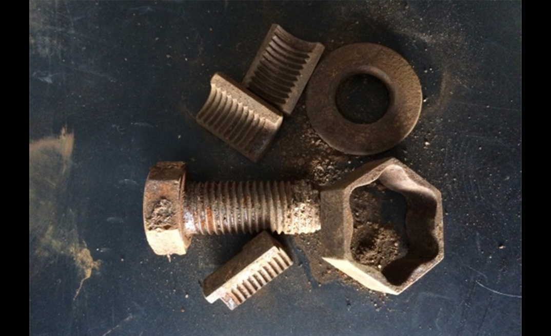 The Segnut has a patented three-segment release system where the nut falls away from the bolt on removal.