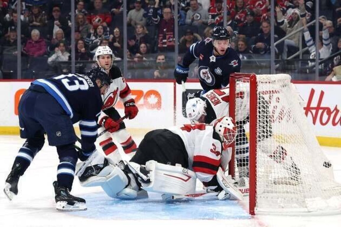 Jets outlast Devils for back-to-back wins after 11-game slide