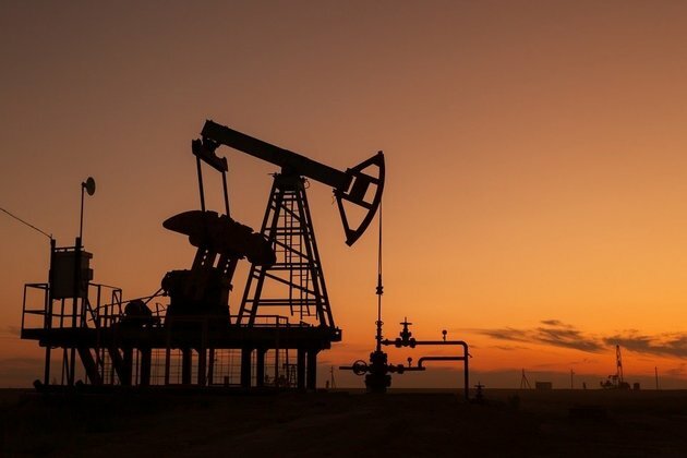 Oil retreats from 10-month high as stronger dollar dents rally