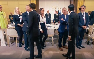 Octopus' Greg Jackson and Zoisa North-Bond with Emmanuel Macron and Rishi Sunak - Credit: Octopus Energy