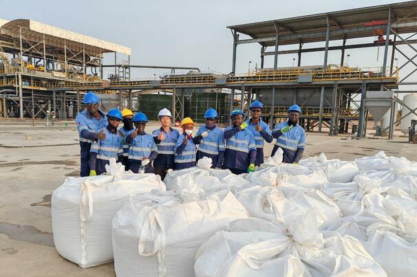 Kodal Minerals processing team with first spodumene