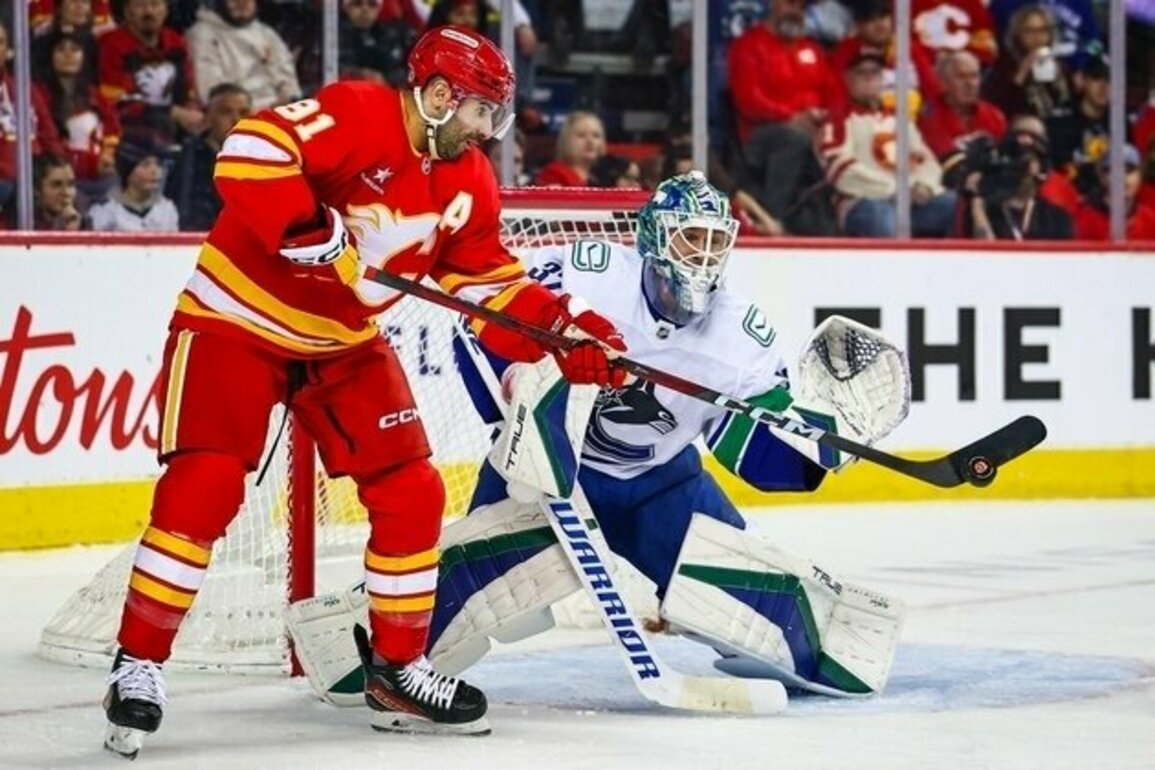 Conor Garland brings key goals as Canucks top Flames in shootout