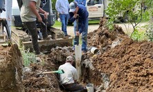  Volunteers from Schroepfer’s Well Drilling and WaterWorks Pump and Supply install a new well pump for the Illert family