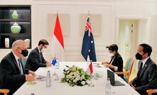 Photo: Scott Morrison joins Indonesian counterparts at a table during a diplomatic ceremony