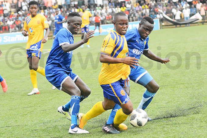  s ike utyaba centre is fouled by s van tege right during the match at ugogo hoto by ichael subuga