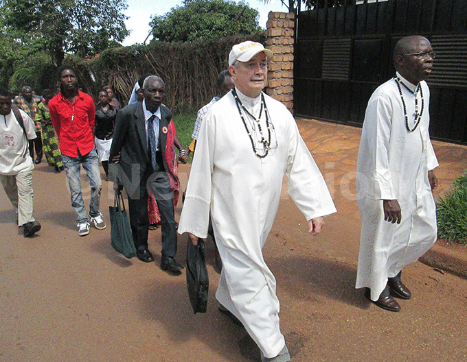  r habanon and r yombi with christians  during the memorial pilgrimage for rapeera