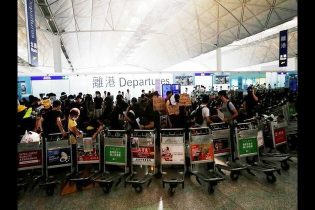 Hong Kong protests: Situation tense as police reach airport