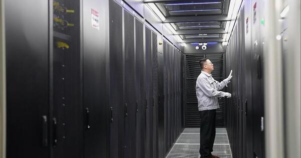 Data center engineers working silently behind booming AI services