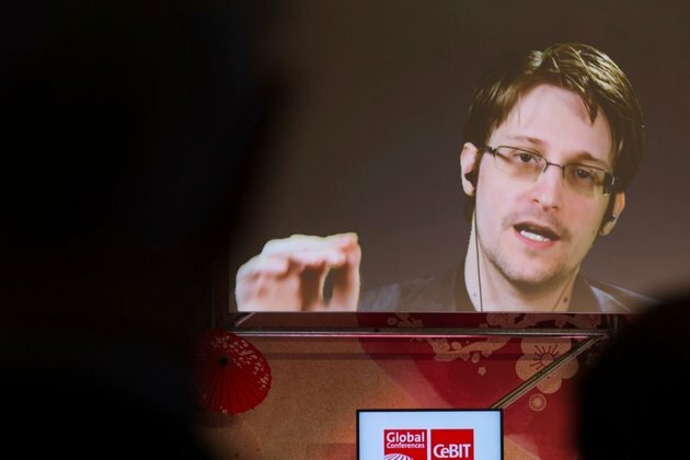 US Whistleblower Snowden Gets Russian Passport, TASS Reports