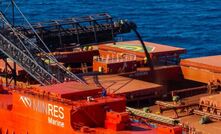 MinRes transhipper loading Onslow Iron’s first ore to a COSCO Shipping bulk carrier. Photo courtey Mineral Resources