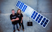  Fleet Space co-founders Matt Pearson and Flavia Tata Niardini with an Alpha satellite