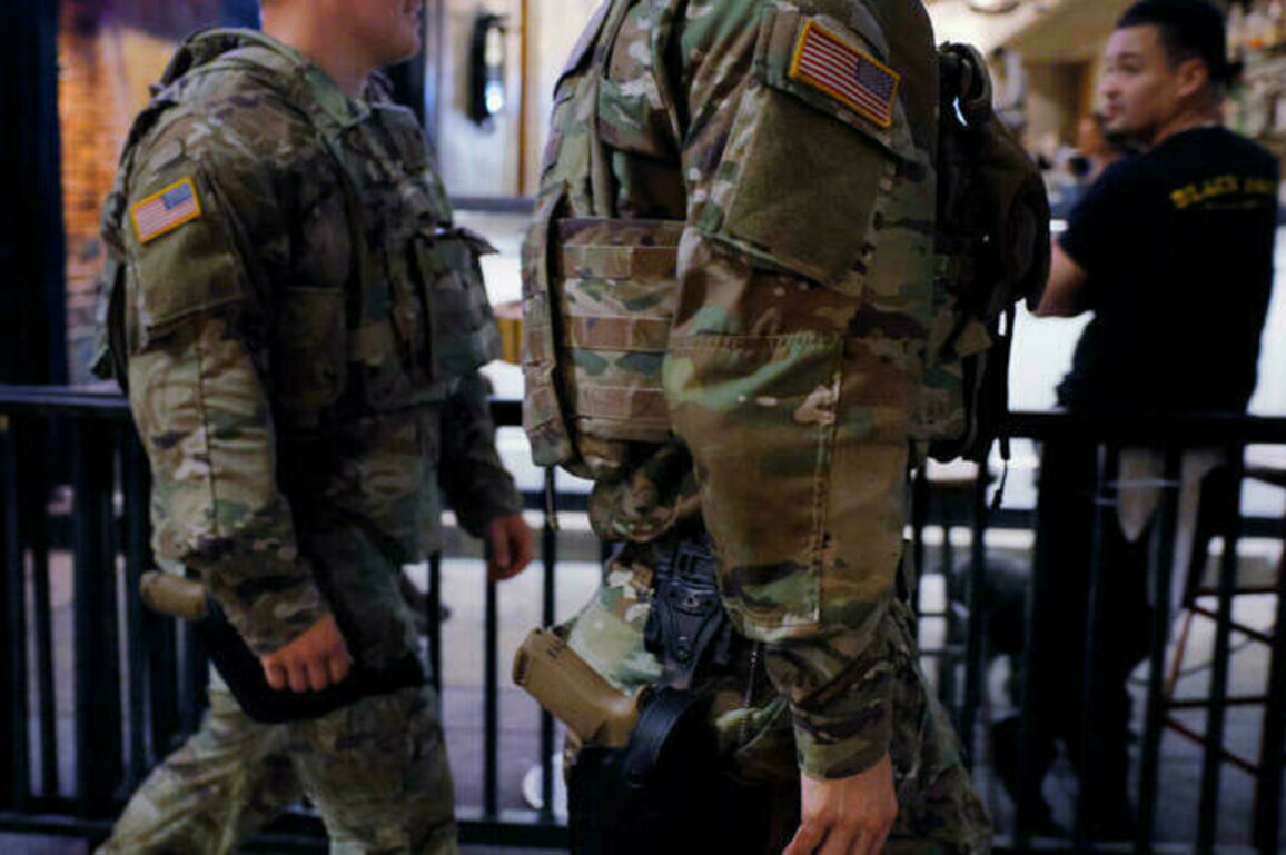 National Guard patrols begin carrying firearms in Washington, DC