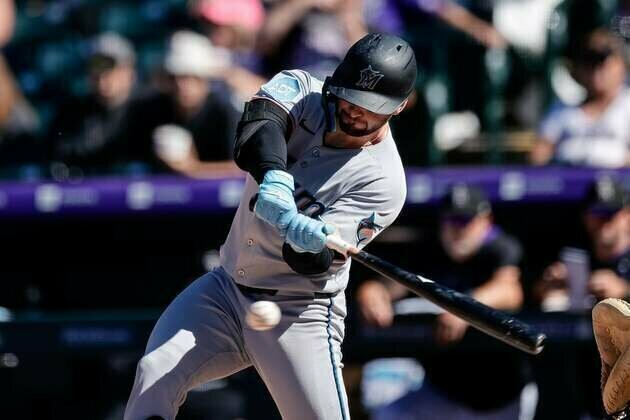 Marlins outslug Rockies to finish series sweep