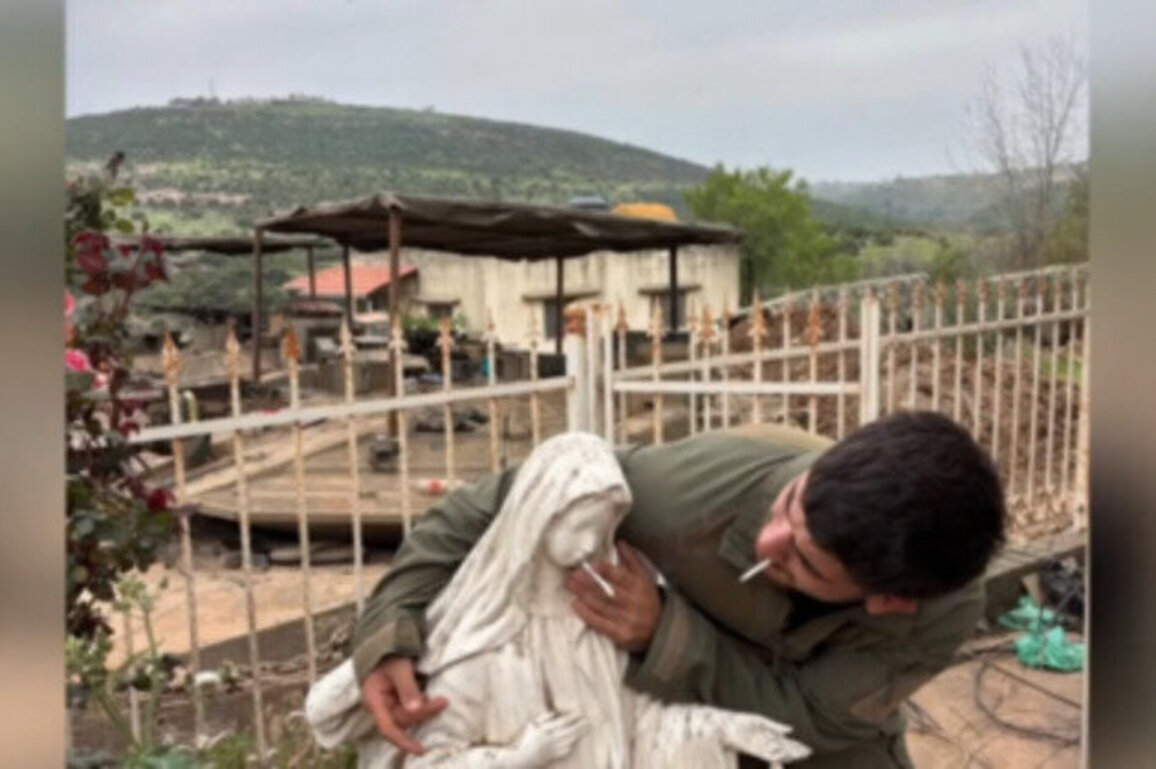 IDF soldier puts cigarette in Virgin Mary statue's mouth