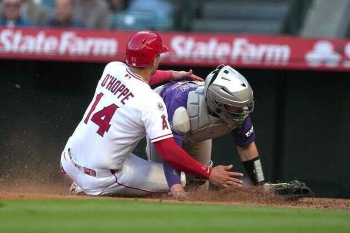 Angels pile up 16 hits to capture series finale vs. Rockies