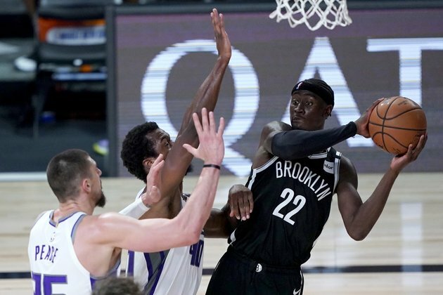 Nets bounce back to top Kings, clinch playoff spot